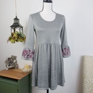 Francesca’s Alta Embroidered sleeve dress.